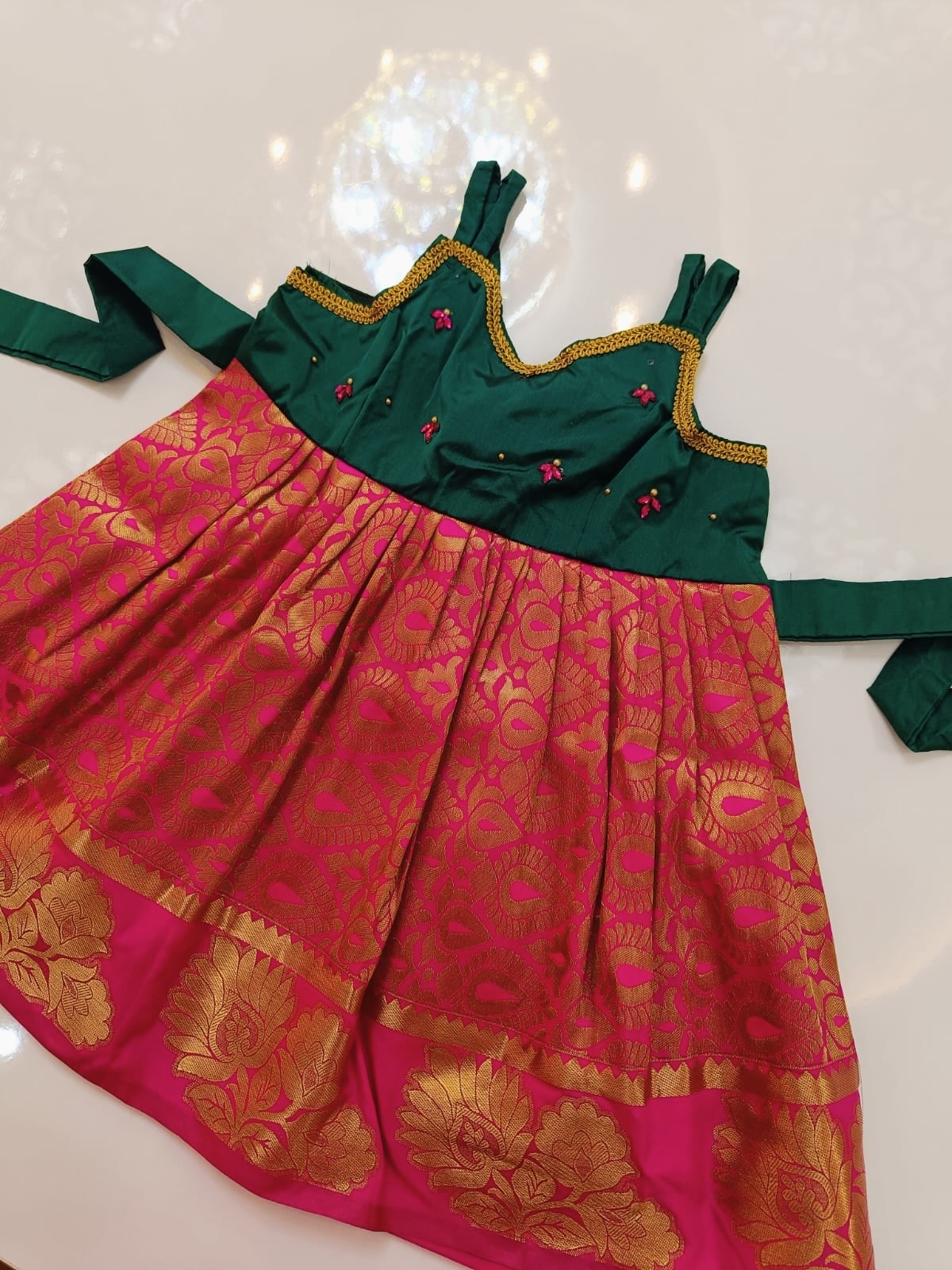 Green And Bright Pink Frock With Gold Zari